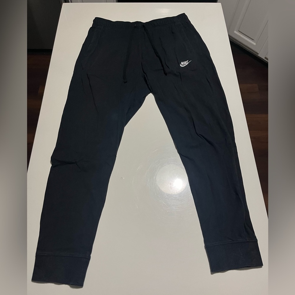 Premium Nike Black Joggers. Size large. Excellent workout and comfort apparel!